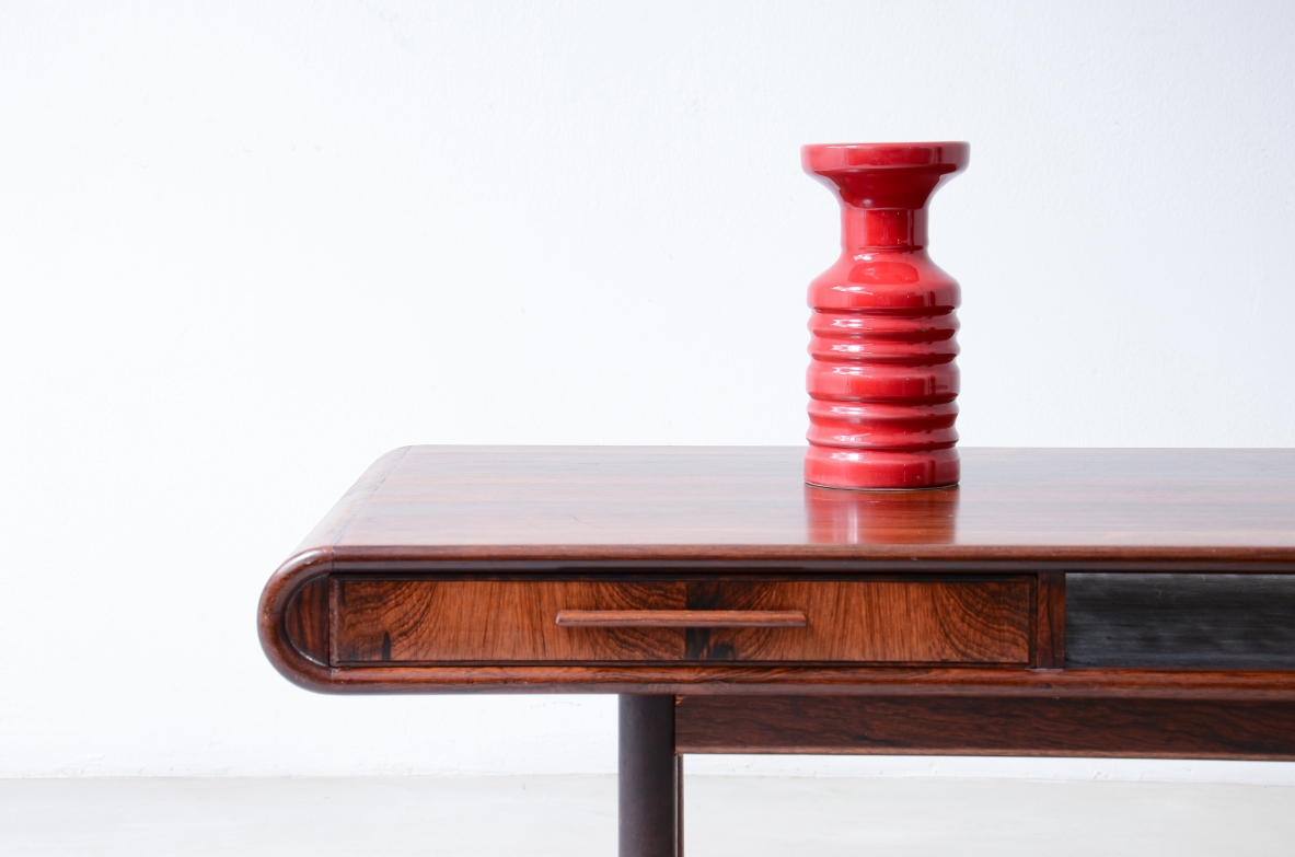 low table with two tops, an open compartment, and two drawers.Brazilian manufacture, ca. 1960.
