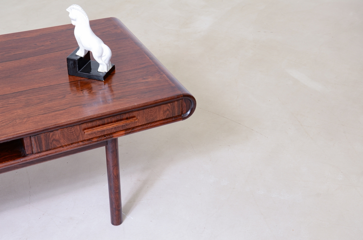 low table with two tops, an open compartment, and two drawers.Brazilian manufacture, ca. 1960.
