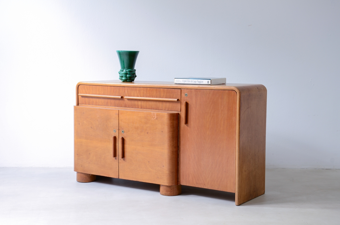 Mobile ad ante e cassetti in legno biondo.  Manifattura francesce epoca Art Deco, 1930ca.
