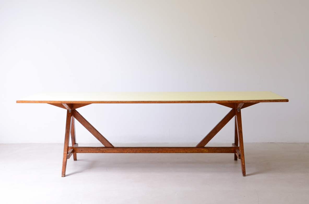 Large oak table with a pastel yellow Formica top 1955