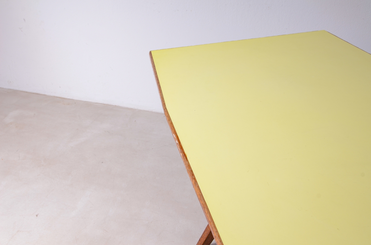 Large oak table with a pastel yellow Formica top 1955