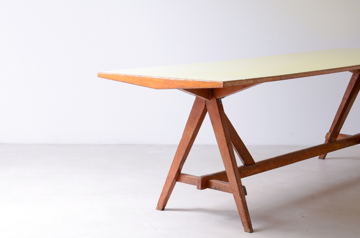 Large oak table with a pastel yellow Formica top 1955