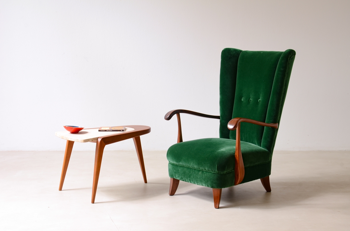 Lio Carminati Elegant armchair in shaped wood and padded fabric 1940's