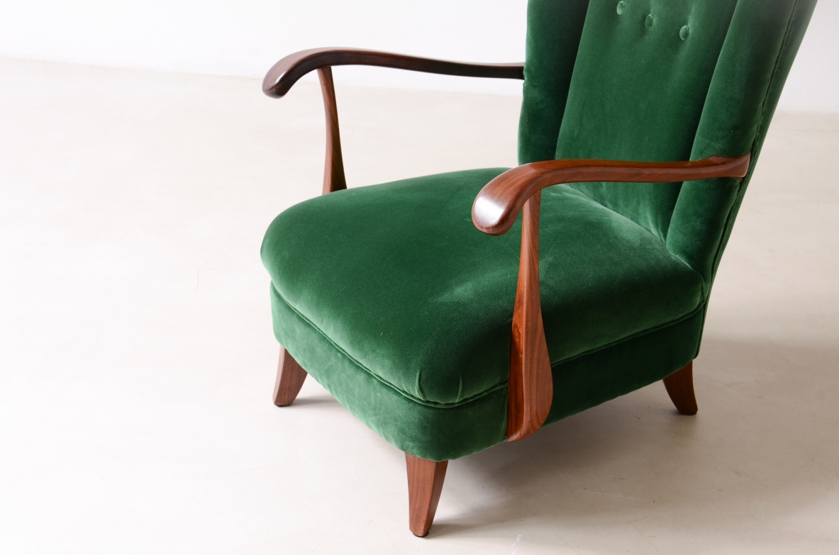 Lio Carminati Elegant armchair in shaped wood and padded fabric 1940's