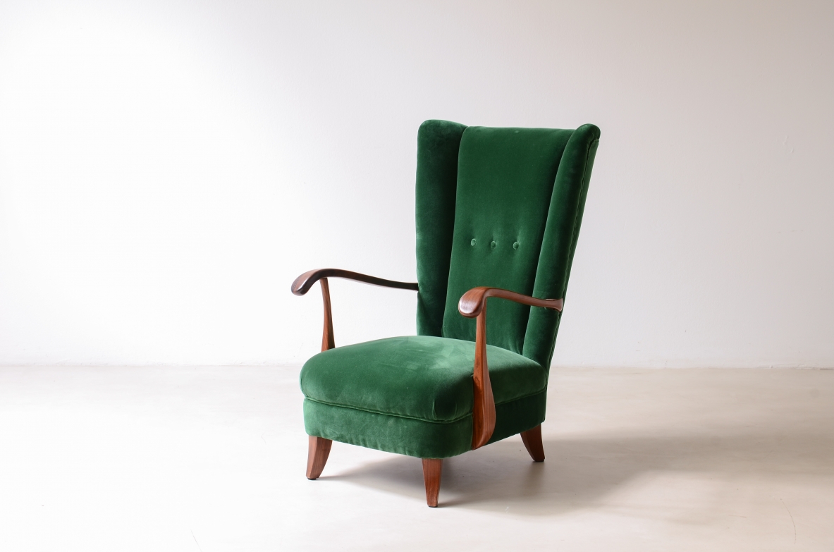 Lio Carminati Elegant armchair in shaped wood and padded fabric 1940's