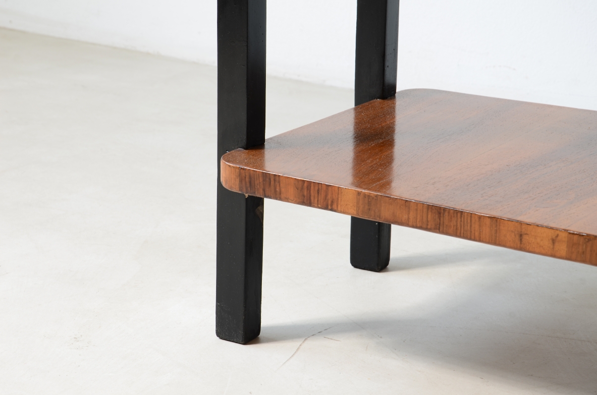 Walnut and stained wood coffee table with two shelves. Made in the 1930s.