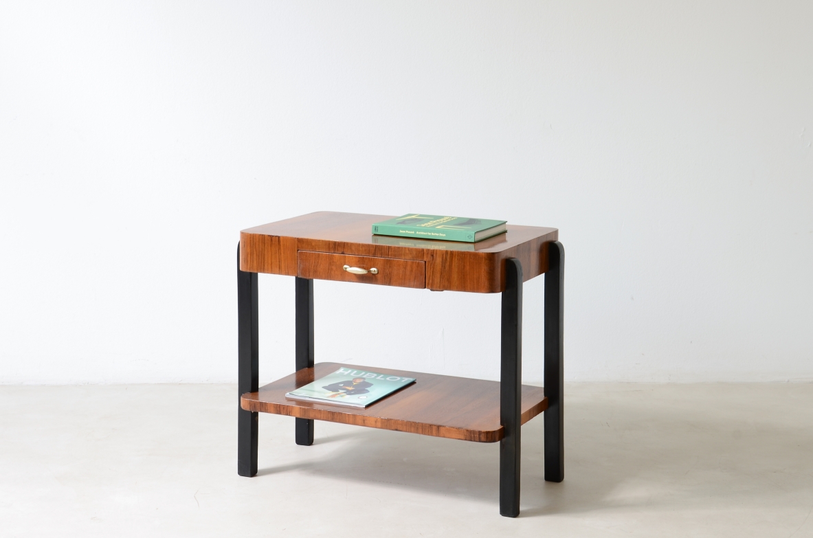 Walnut and stained wood coffee table with two shelves. Made in the 1930s.
