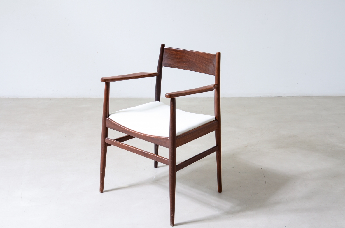 Raro set di 8 eleganti poltroncine in  legno di tek sagomato. Manifattura L.Jacobsen, 1960ca.