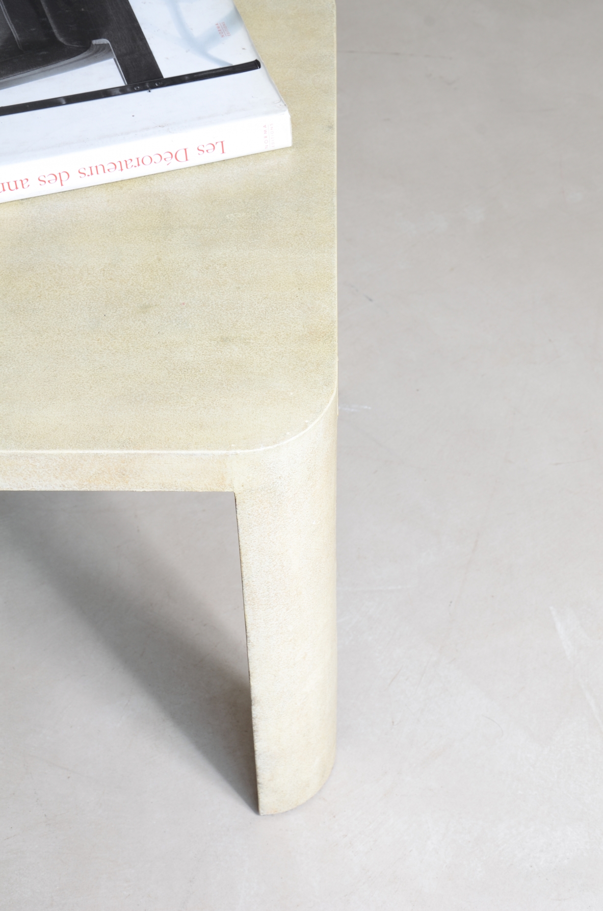 Elegant parchment-covered wooden coffee table, Italian manufacture, circa 1940.