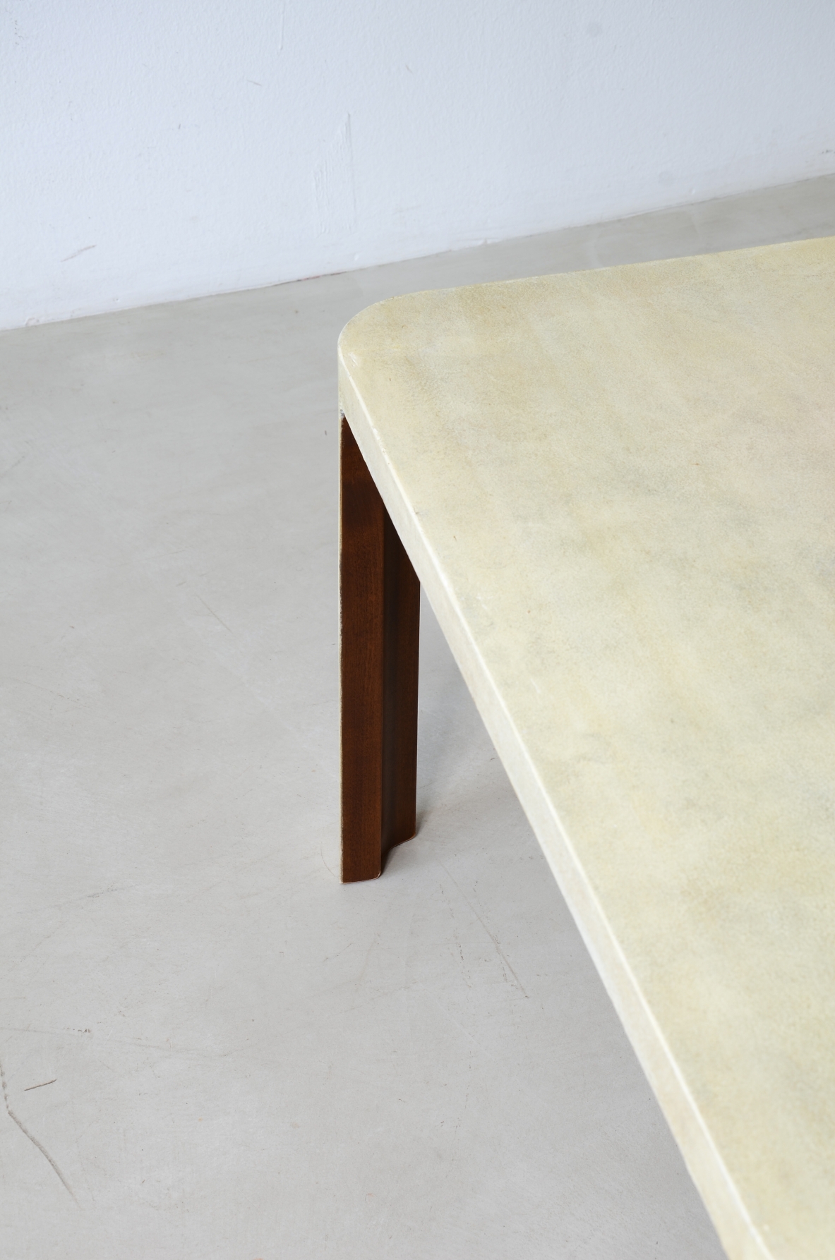 Elegant parchment-covered wooden coffee table, Italian manufacture, circa 1940.