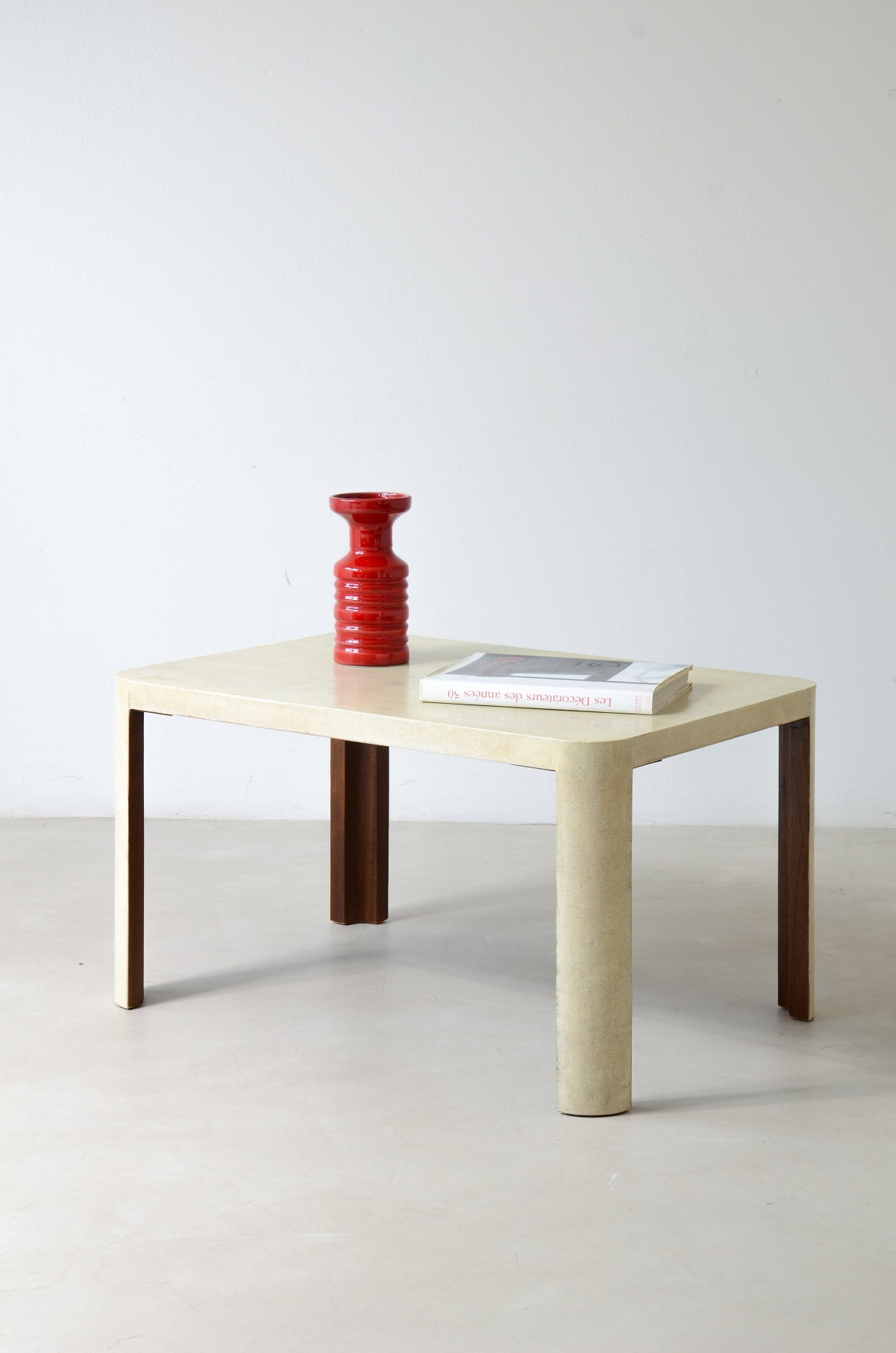 Elegant parchment-covered wooden coffee table, Italian manufacture, circa 1940.