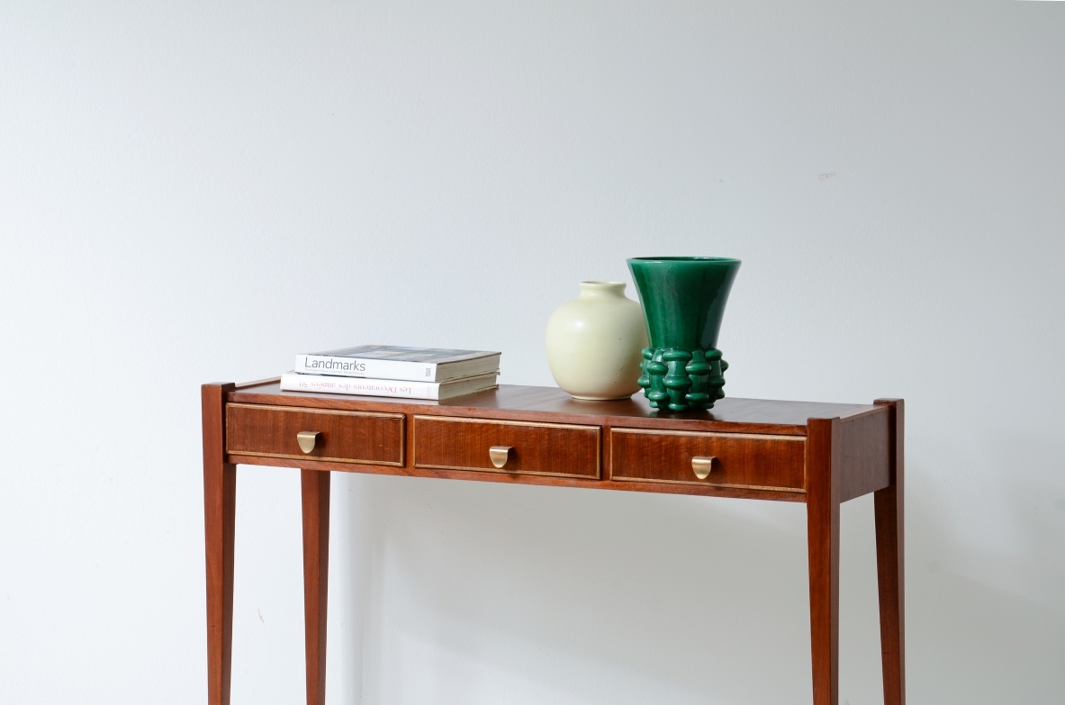 Elegant console table with three drawers on the front. talian manufacture, ca. 1955.