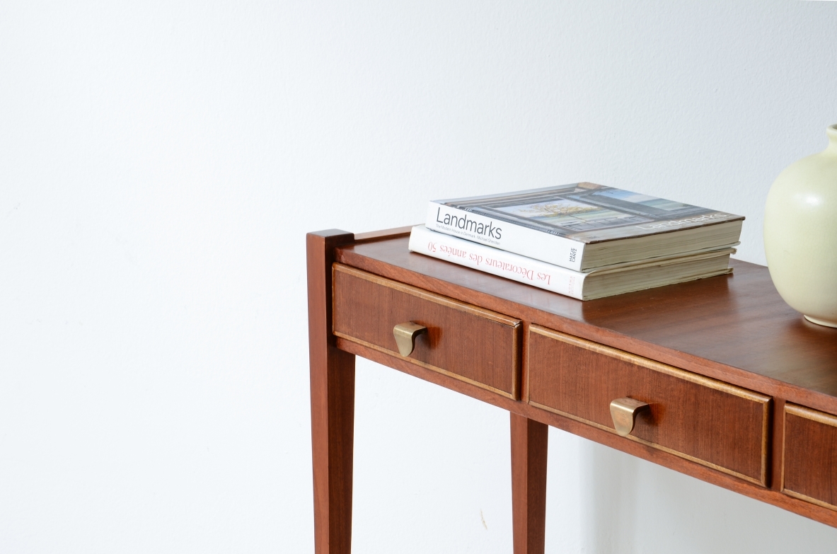Elegant console table with three drawers on the front. talian manufacture, ca. 1955.