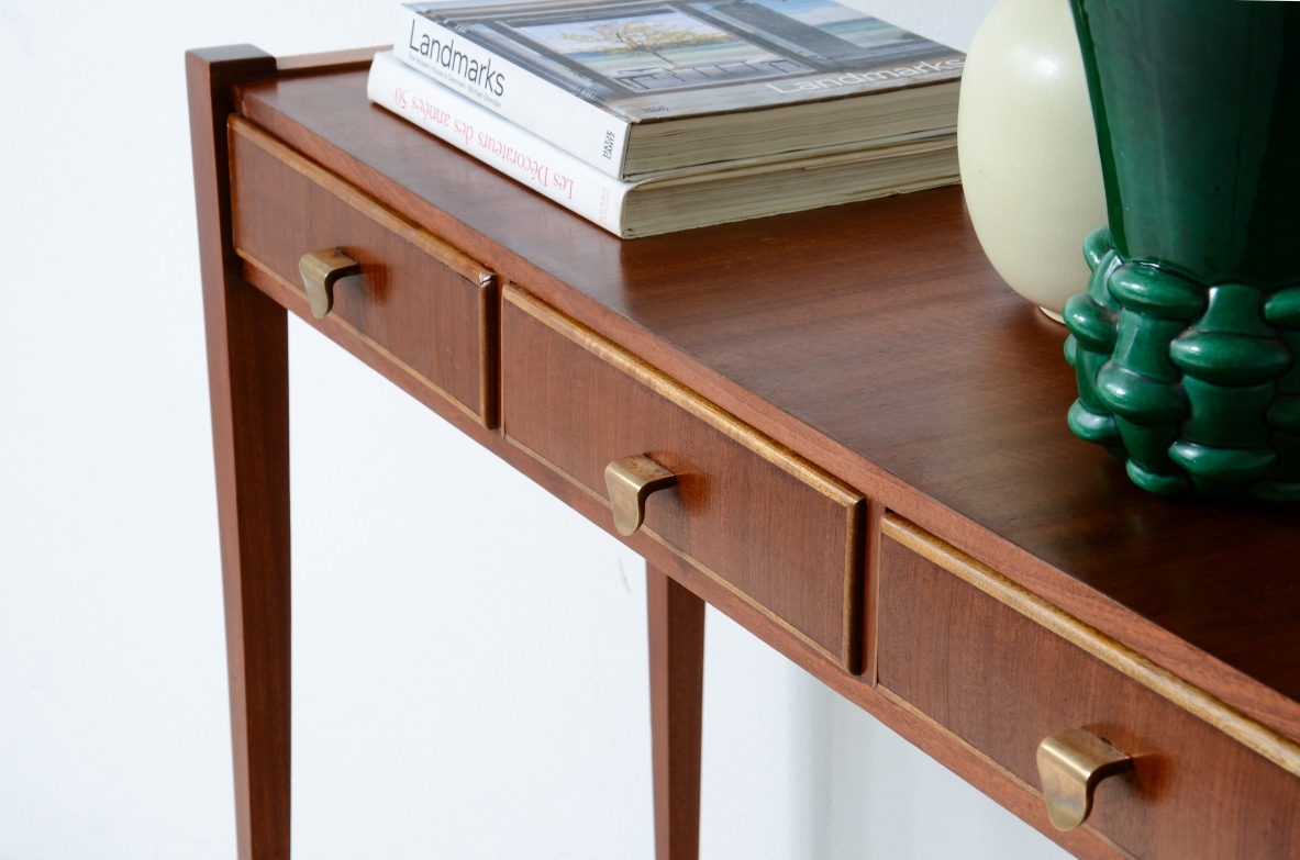 Elegant console table with three drawers on the front. talian manufacture, ca. 1955.