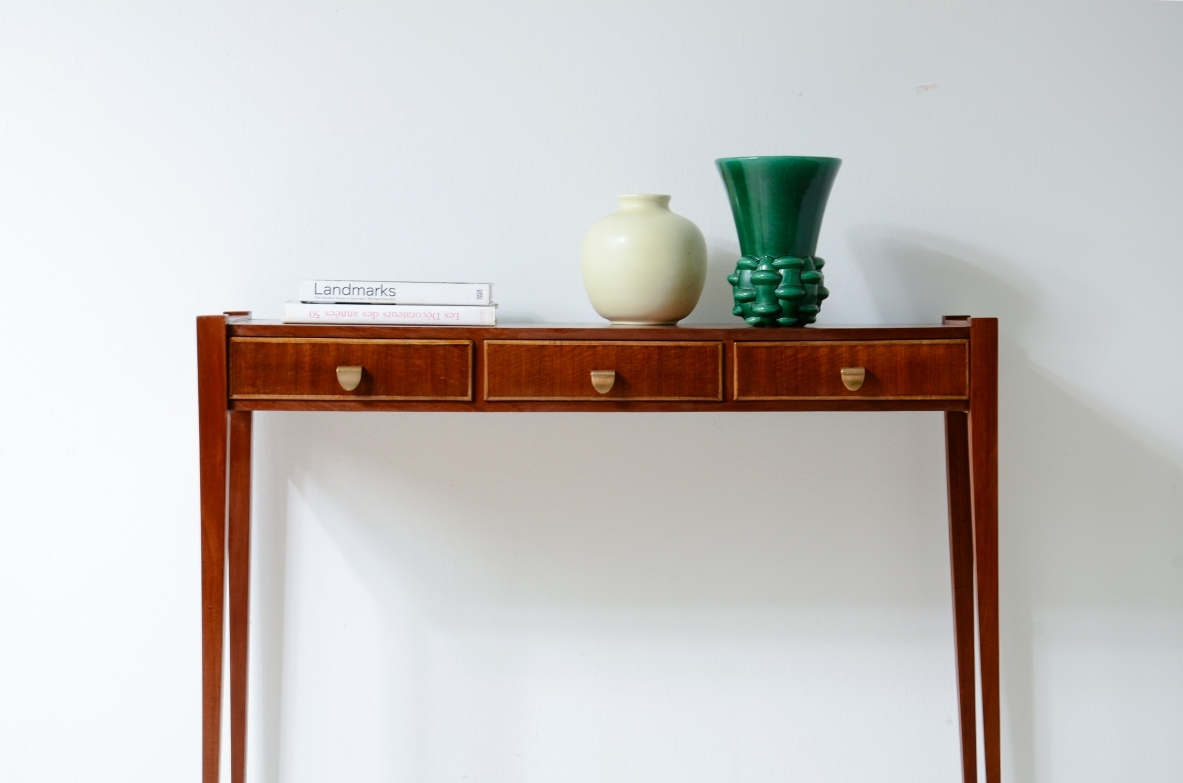 Elegant console table with three drawers on the front. talian manufacture, ca. 1955.