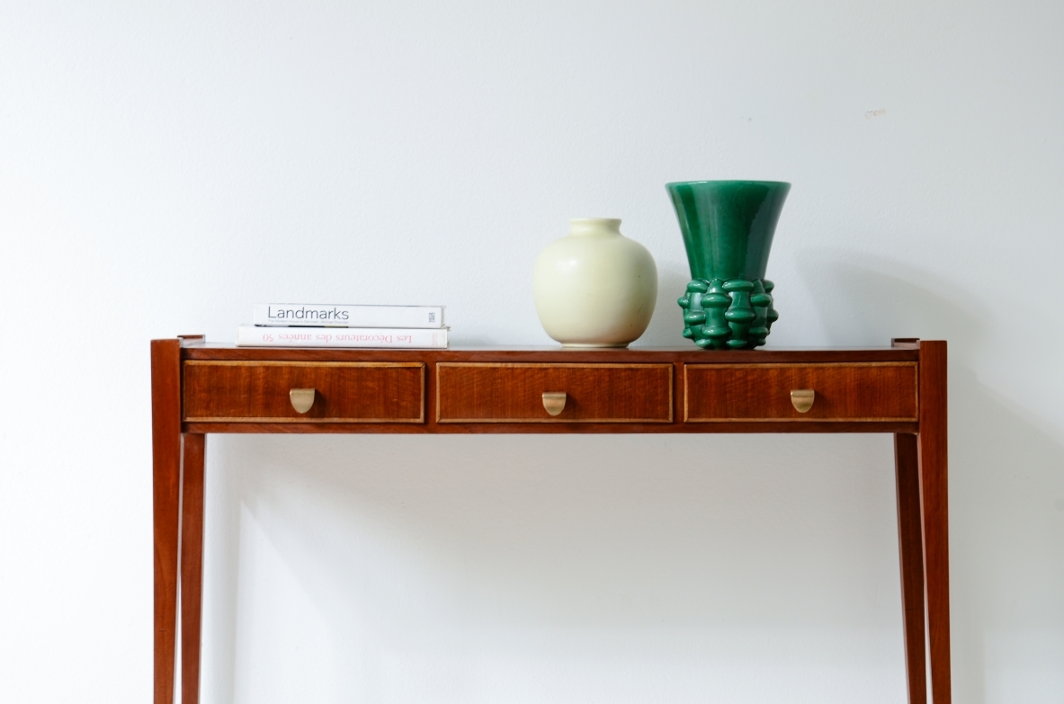 Elegant console table with three drawers on the front. talian manufacture, ca. 1955.