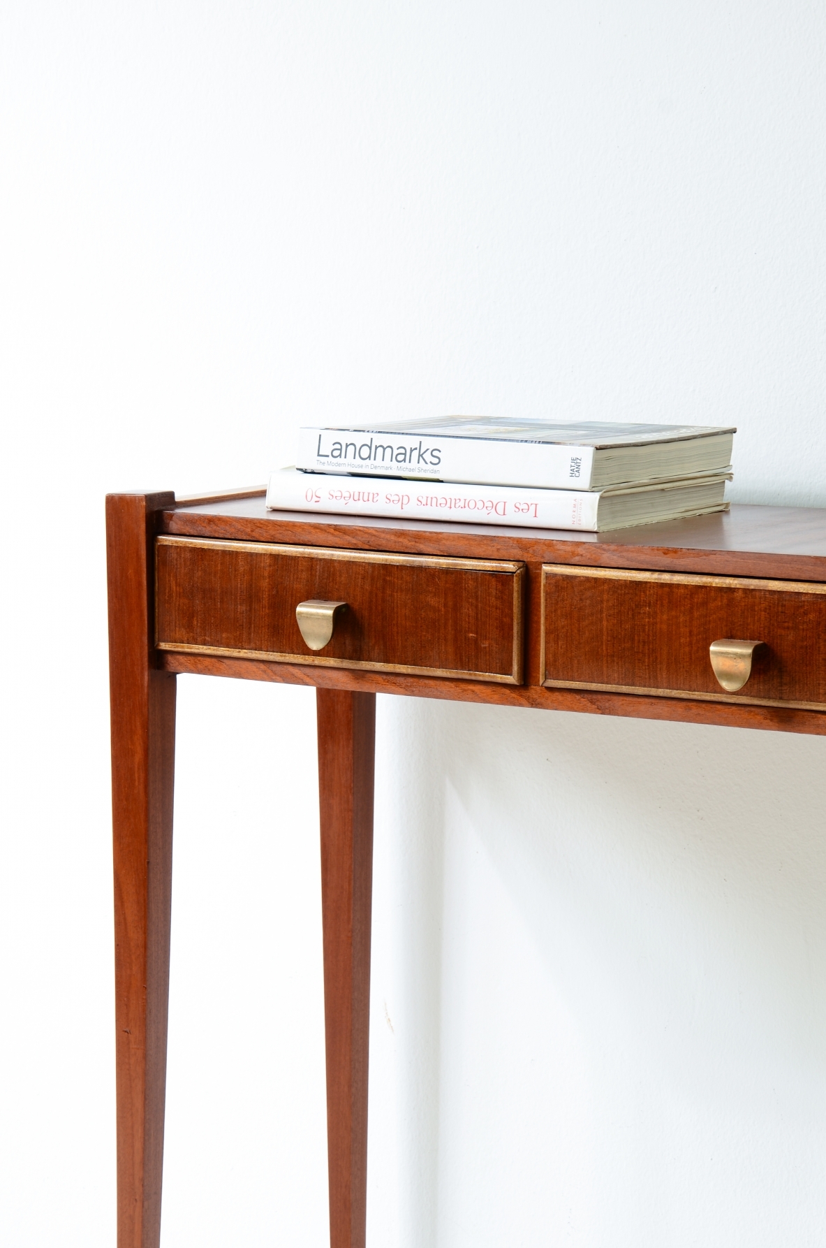 Elegant console table with three drawers on the front. talian manufacture, ca. 1955.