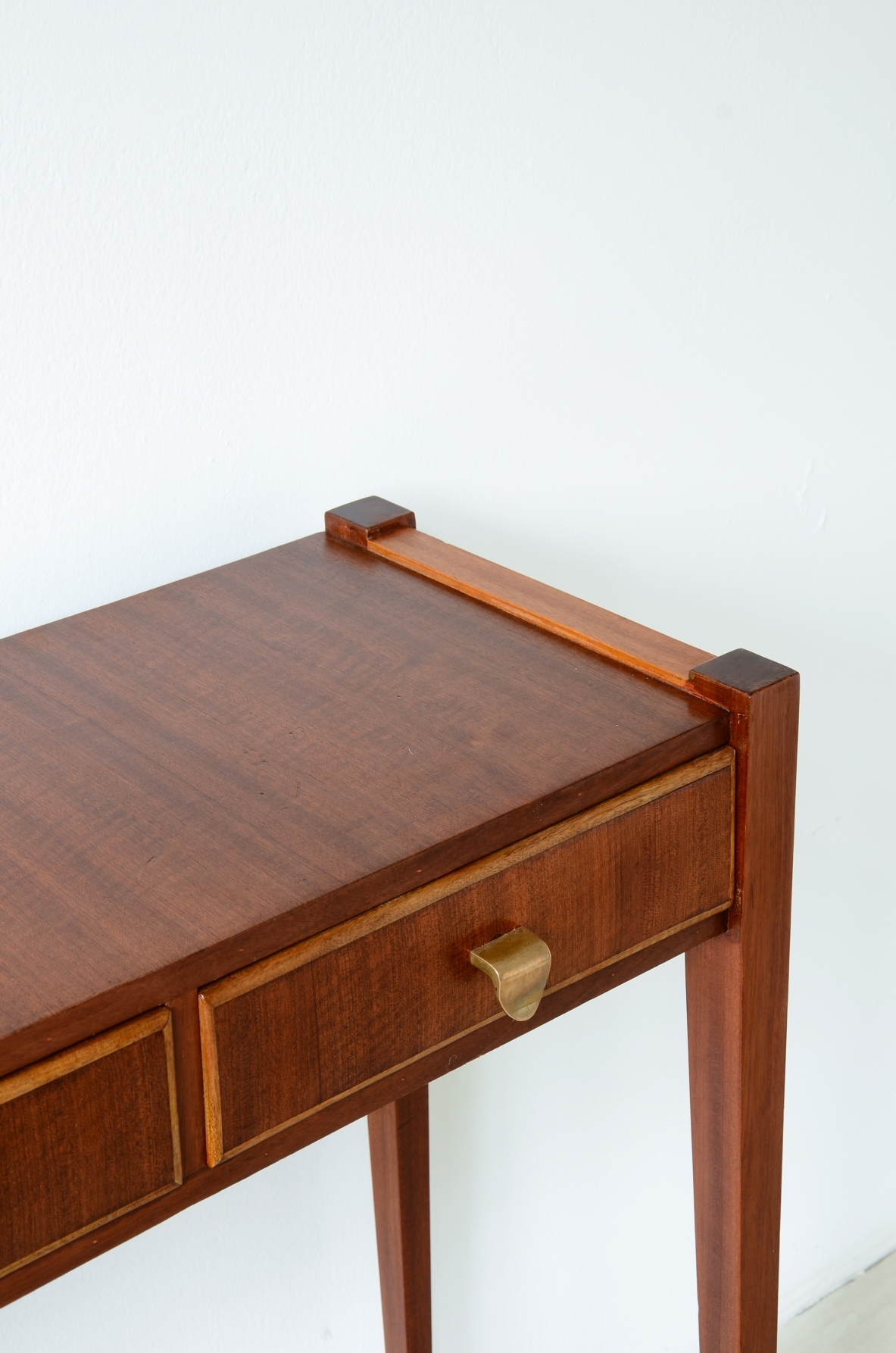 Elegant console table with three drawers on the front. talian manufacture, ca. 1955.