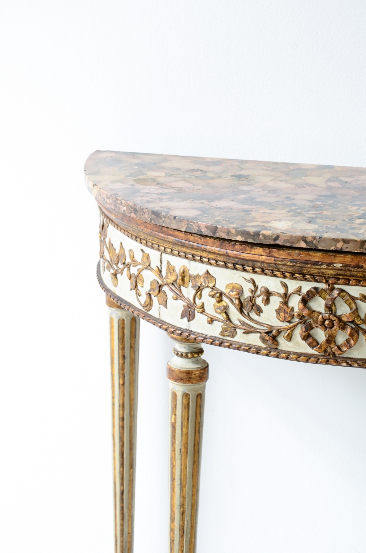 Splendid half-moon console table in lacquered and gilded wood. Made in Naples, ca. 1780-1790.