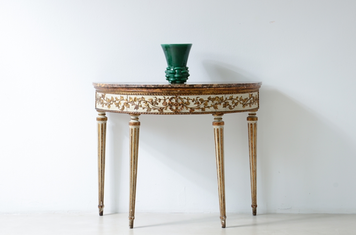 Splendid half-moon console table in lacquered and gilded wood. Made in Naples, ca. 1780-1790.