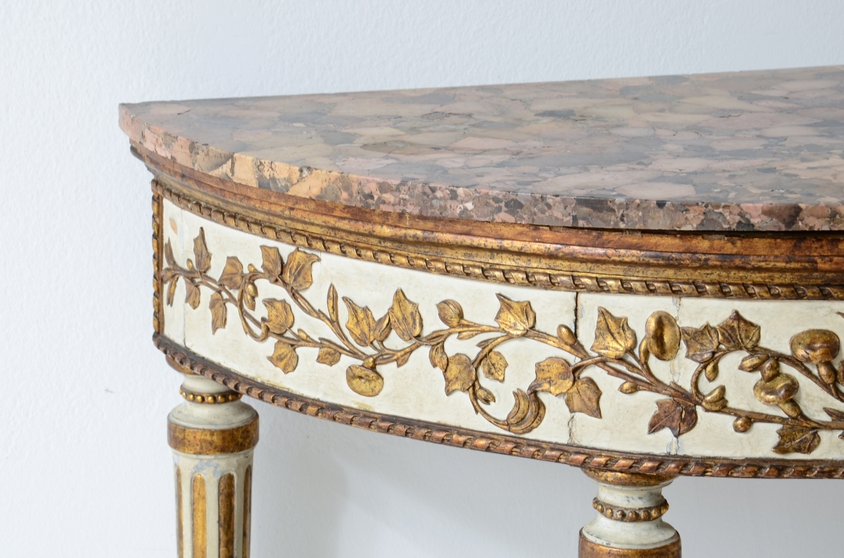 Splendid half-moon console table in lacquered and gilded wood. Made in Naples, ca. 1780-1790.