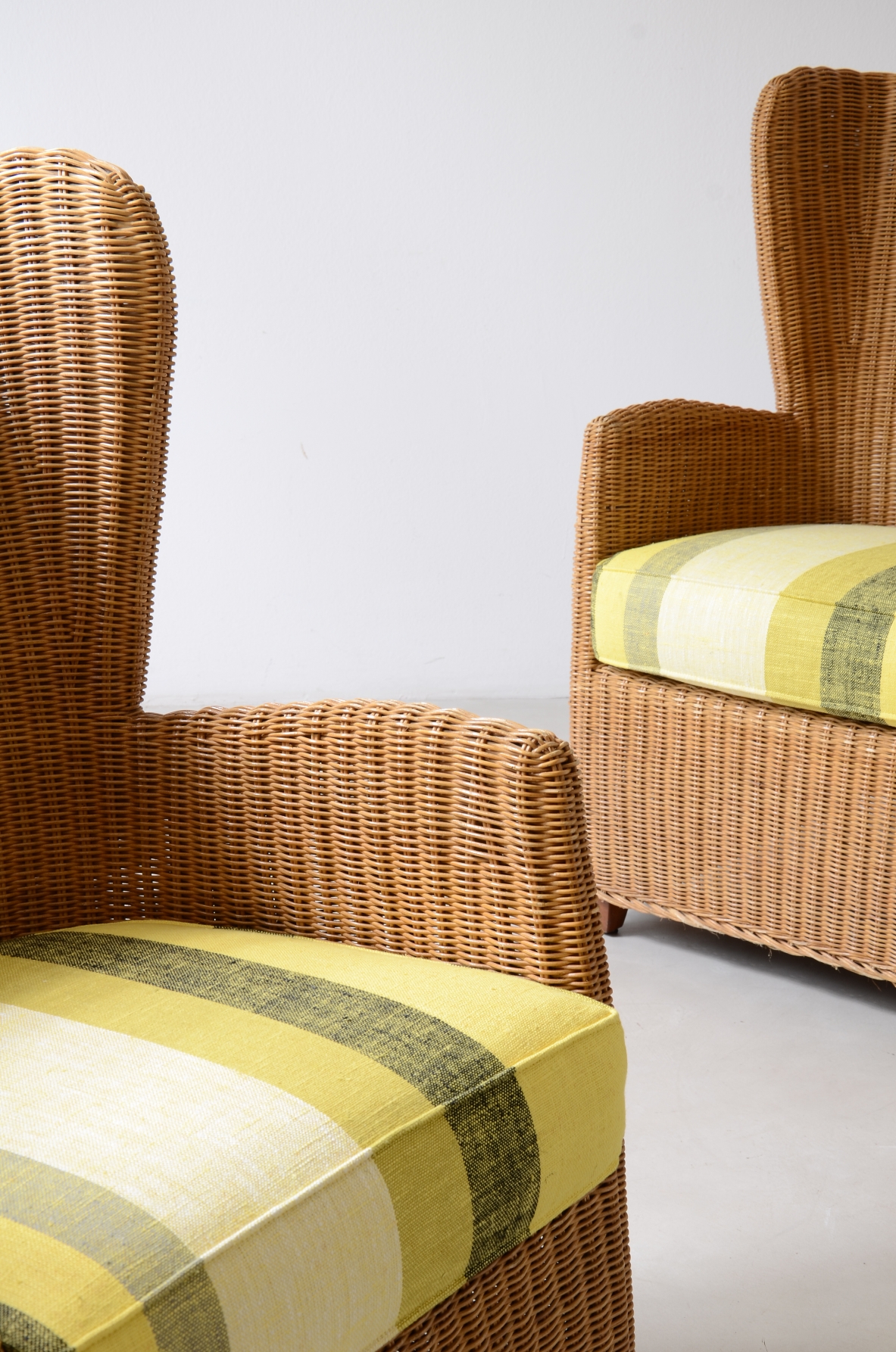 Two large woven rattan armchairs, Italian manufacture