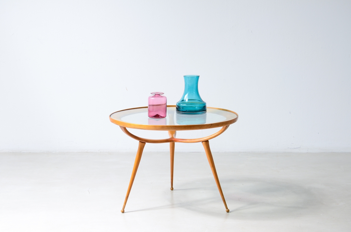 1950'S Cherrywood coffee table with a circular cut glass top.