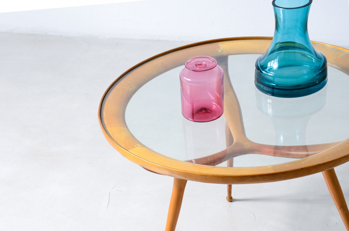 1950'S Cherrywood coffee table with a circular cut glass top.