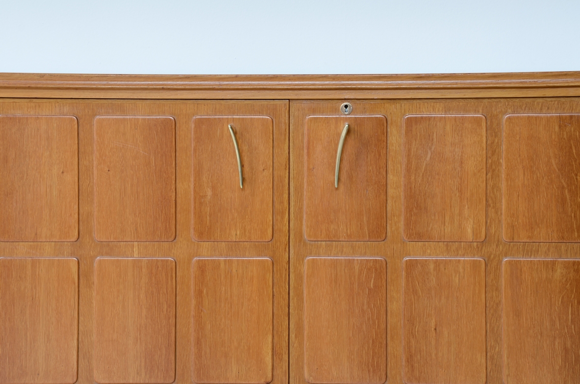 Paolo Buffa Large four-door blond oak cabinet Made around 1950.