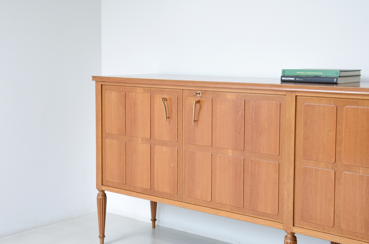 Paolo Buffa Large four-door blond oak cabinet Made around 1950.