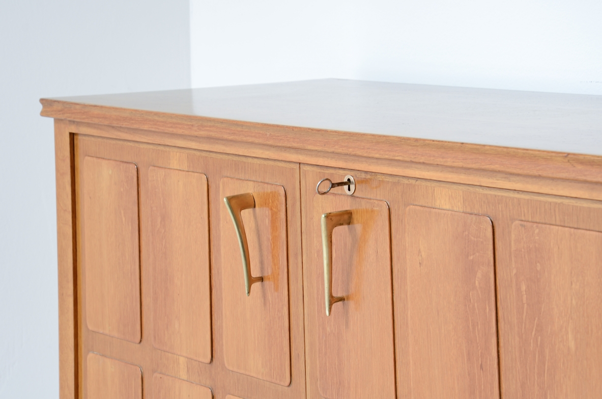 Paolo Buffa Large four-door blond oak cabinet Made around 1950.