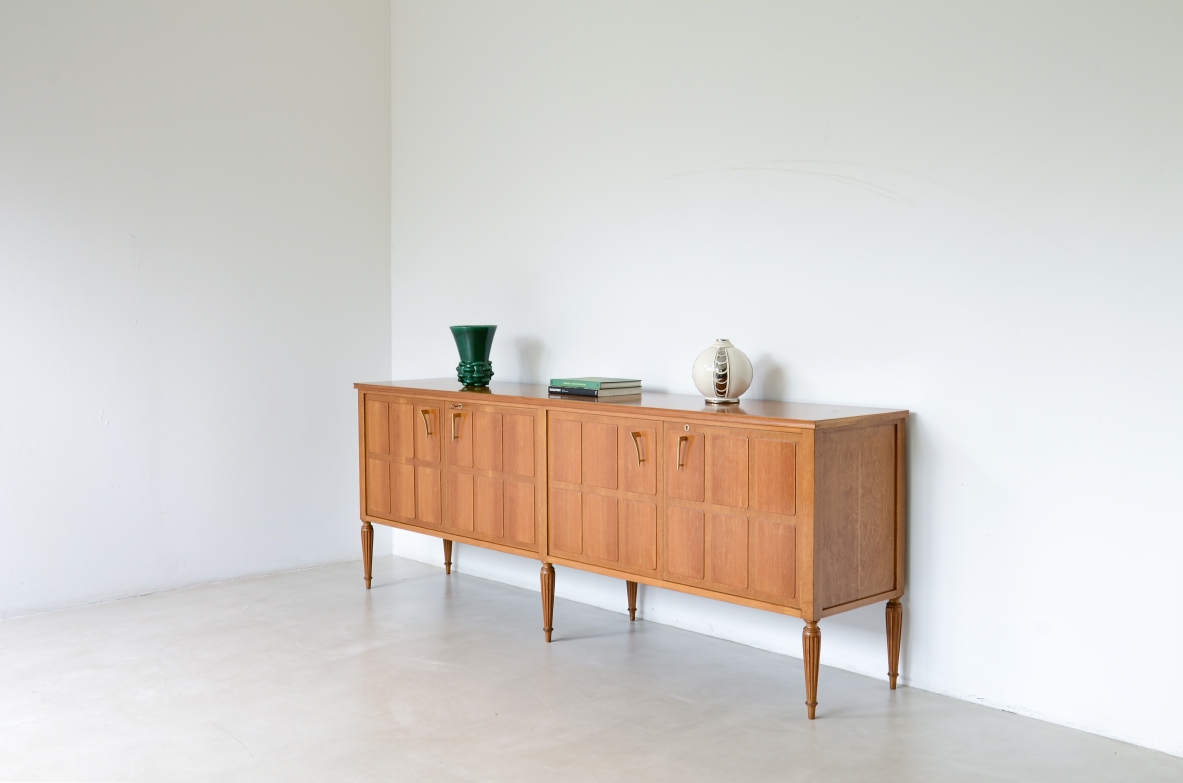 Paolo Buffa Large four-door blond oak cabinet Made around 1950.