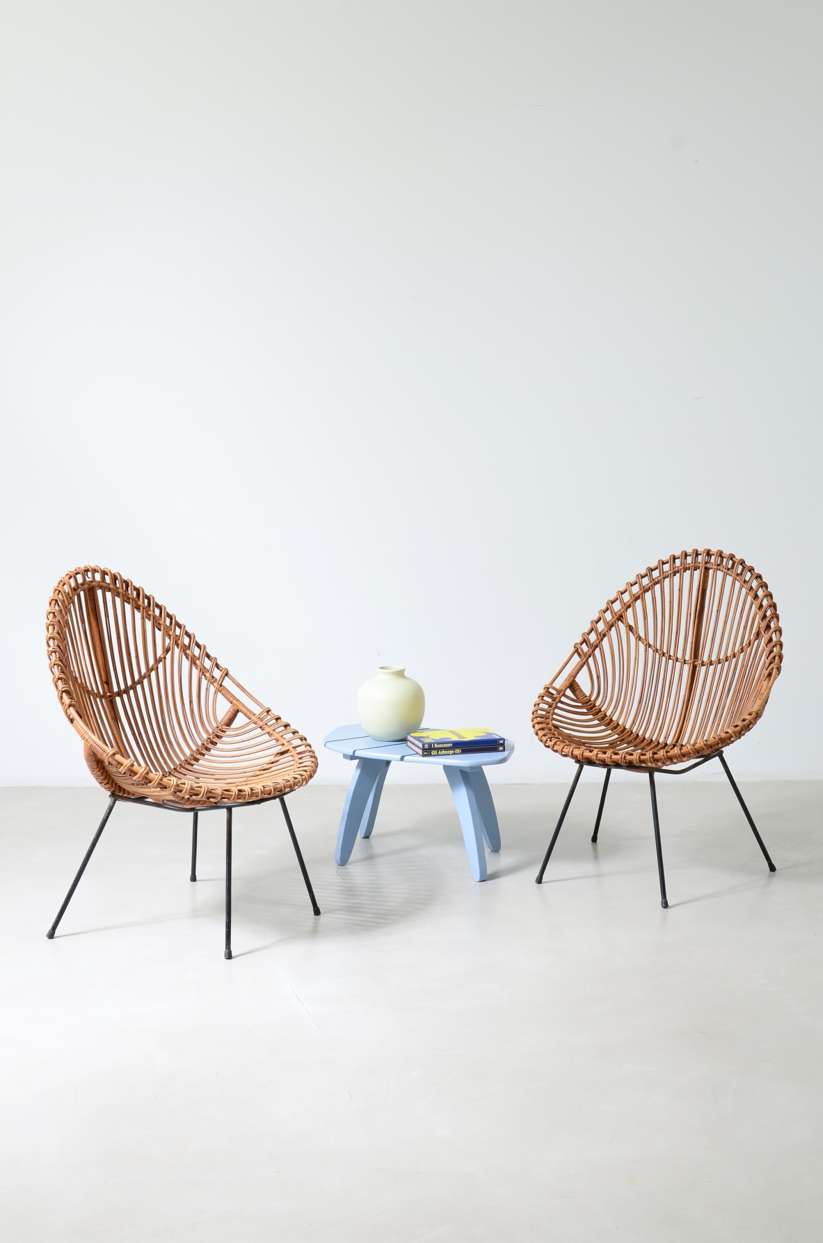 Coppia di poltroncine a pozzetto in rattan curvato, Bonacina Italia, 1950ca.
