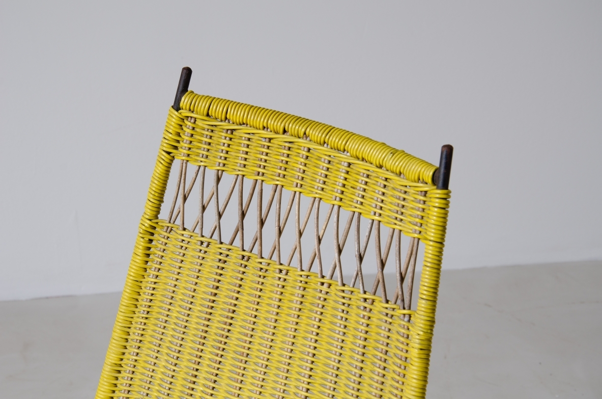 Pair of armchairs with an iron frame and woven rubber and rattan thread.Saporiti Italia, ca. 1950.