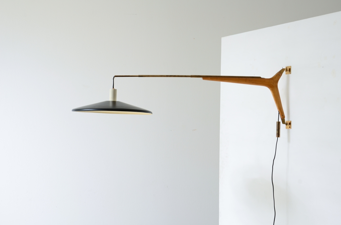 Franco Buzzi, wall lamp with extendable brass arm. Stilnovo 1950's