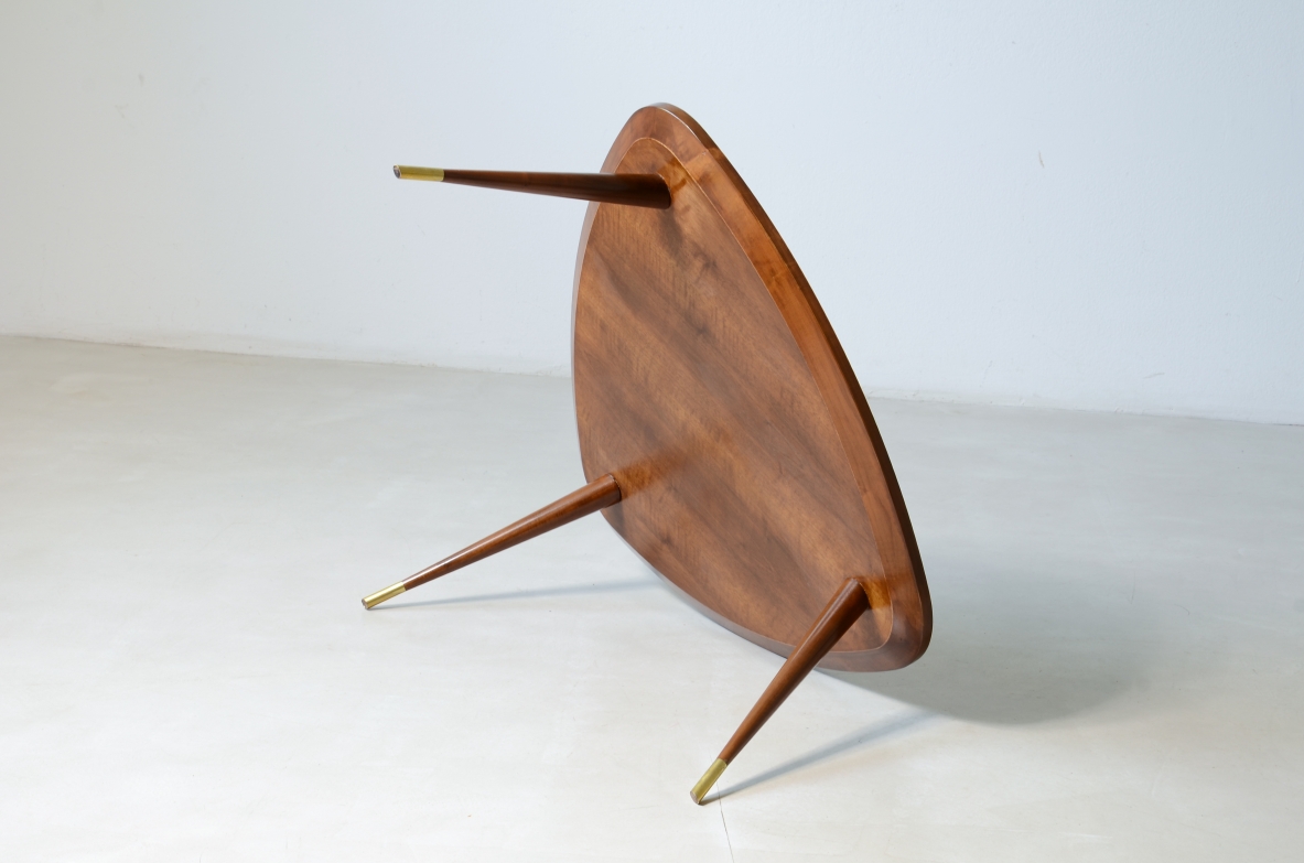 Osvaldo Borsani  Pair of elegant coffee tables with a beveled glass top. Reissue by Officina Antiquaria