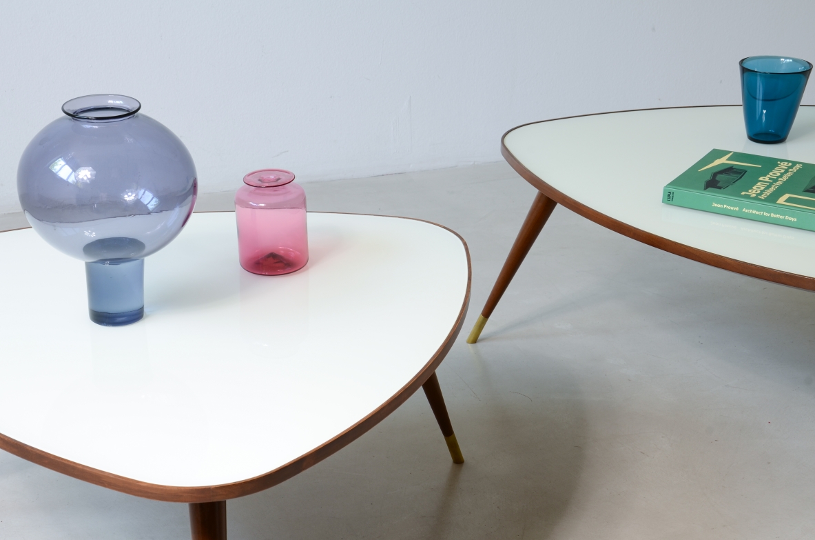 Osvaldo Borsani  Pair of elegant coffee tables with a beveled glass top. Reissue by Officina Antiquaria