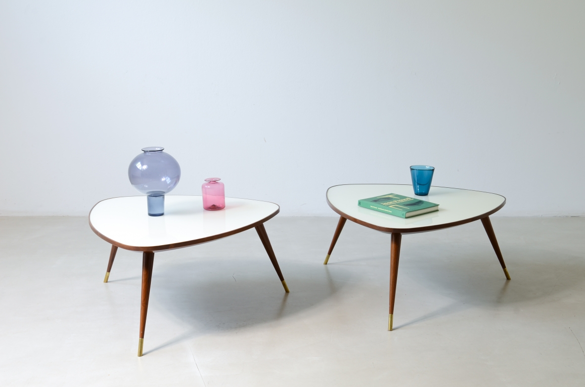 Osvaldo Borsani  Pair of elegant coffee tables with a beveled glass top. Reissue by Officina Antiquaria