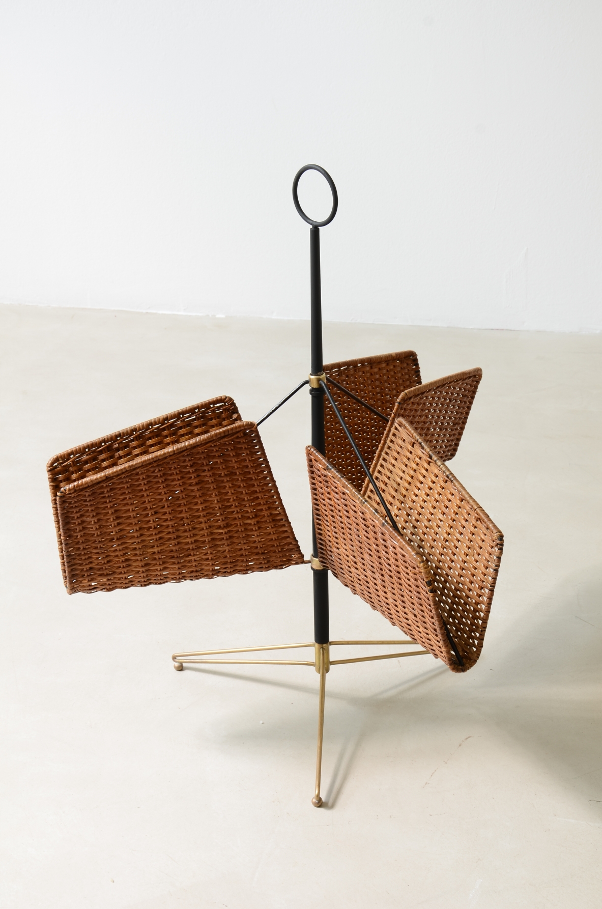 Metal and brass magazine rack. French manufacture, 1950s.