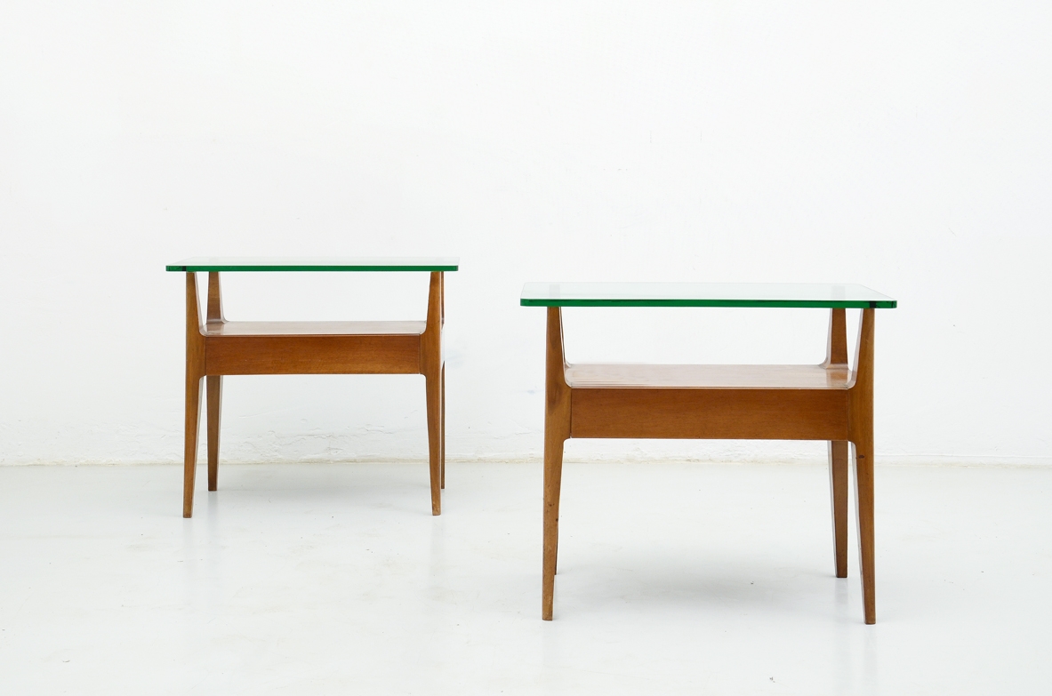 Pair of wooden bedside tables with glass shelf, Italy 1950