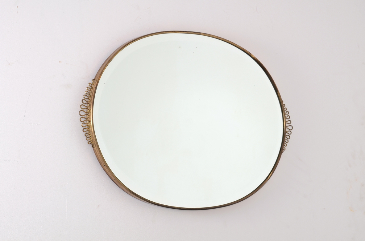 Specchiera ovale con cornice in ottone, Italia 1950ca.