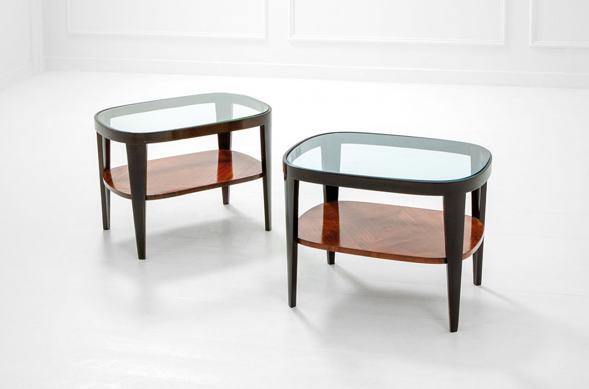 Pair of low tables with glass top.