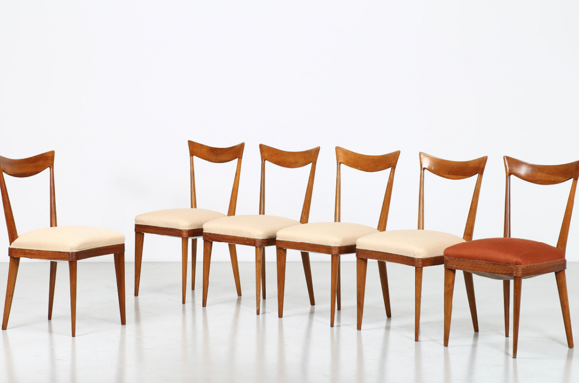 Group of six chairs in walnut wood with upholstered fabric seat