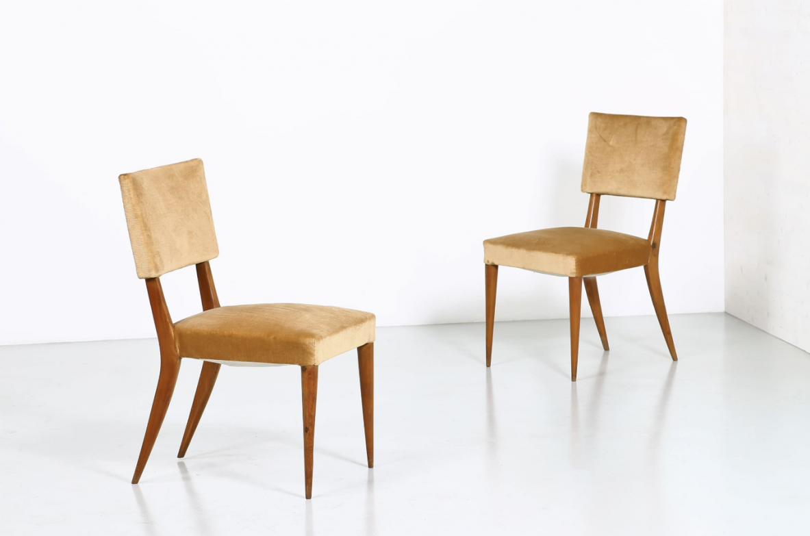 Enrico Ciuti, two 1950's chairs in light wood with upholstered seat and back.