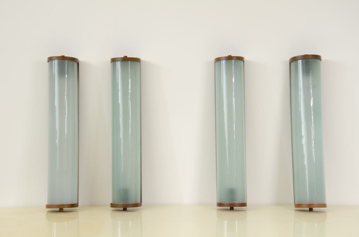 Four large appliques in glass and brass, 1940s.
