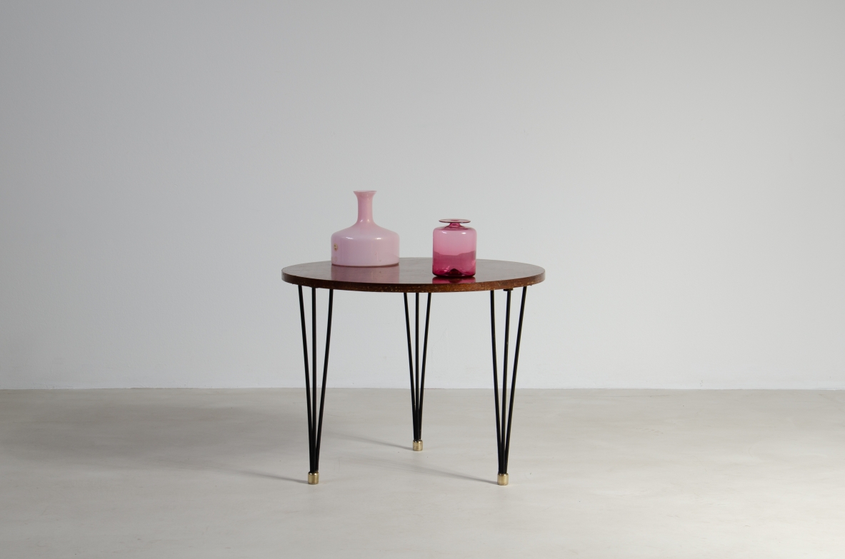 Coffee table with iron and brass legs and wooden top.  Italian manufacture from the 1950s.