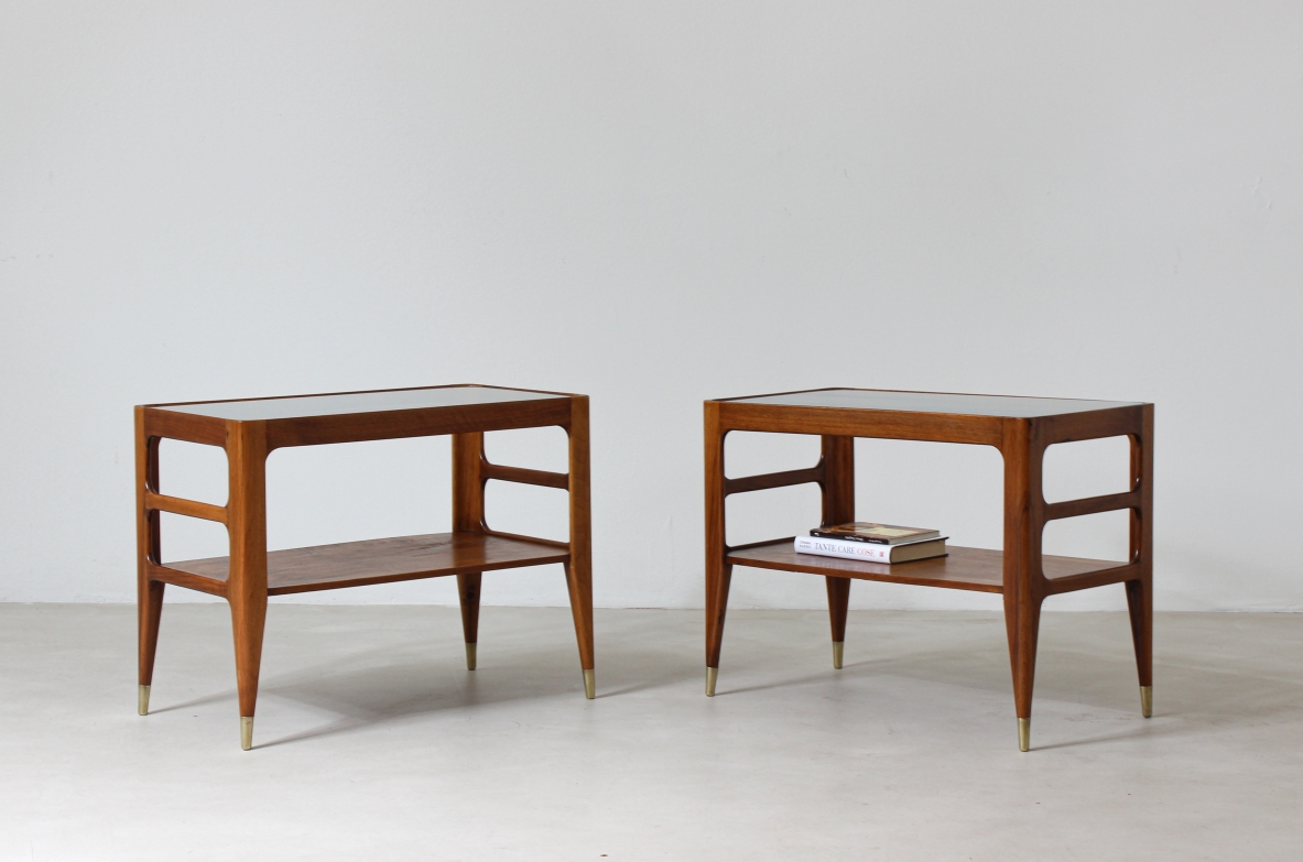 Unique pair of center tables in walnut with crystal glass top and sides openings, nice brass tips.  Attributed to Gio Ponti 1950's