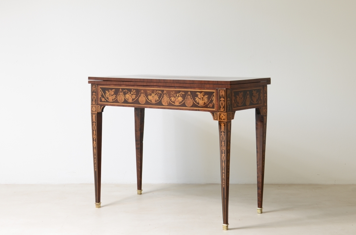 Elegant gaming table with inlay designs.North italian manufacture, Louis XVI era. 1780ca.