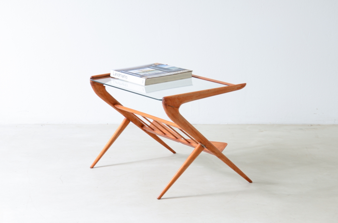 Elegant cherry wood coffee table with magazine rack, Italian manufacture, ca.1950.